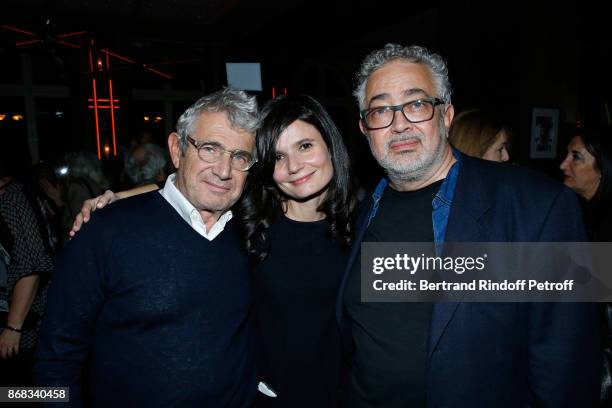 Salome Lelouch standing between Michel Boujenah and his brother Paul Boujenah attend Claude Lelouch celebrates his 80th Birthday at Restaurant...