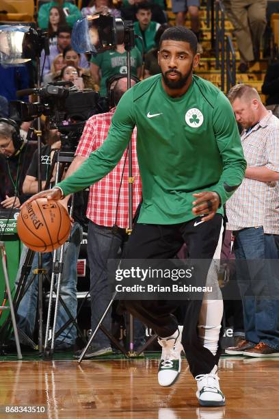 Kyrie Irving of the Boston Celtics handles the ball before the game against the San Antonio Spurs on October 30, 2017 at the TD Garden in Boston,...