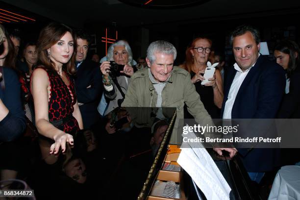 Elsa Zylberstein, Patrick Bruel, Martine Lelouch, her brother Claude Lelouch and CEO of Moma Group, Benjamin Patou listen to Didier Barbelivien, who...
