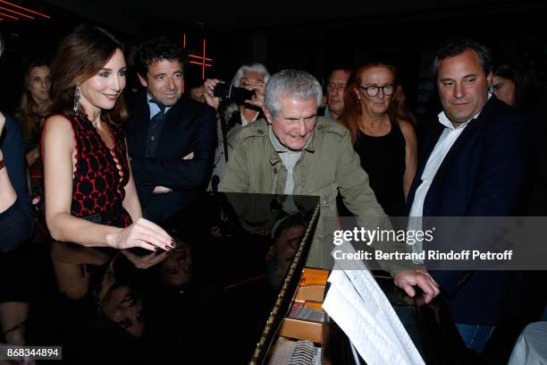 Elsa Zylberstein, Patrick Bruel, Martine Lelouch, her brother Claude Lelouch and CEO of Moma Group, Benjamin Patou listen to Didier Barbelivien, who...