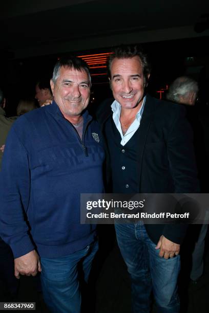 Jean-Marie Bigard and Jean Dujardin attend Claude Lelouch celebrates his 80th Birthday at Restaurant Victoria on October 30, 2017 in Paris, France.