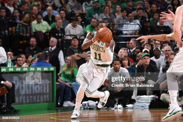Kyrie Irving of the Boston Celtics handles the ball against the San Antonio Spurs on October 30, 2017 at the TD Garden in Boston, Massachusetts. NOTE...