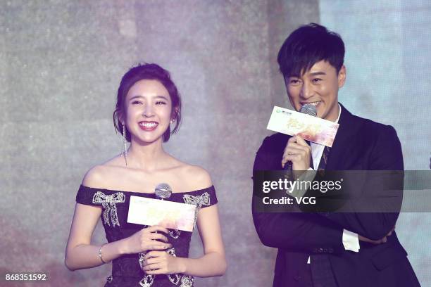 Actor Raymond Lam and actress Tang Yixin attend the press conference of TV series "Rule the World" on October 30, 2017 in Beijing, China.