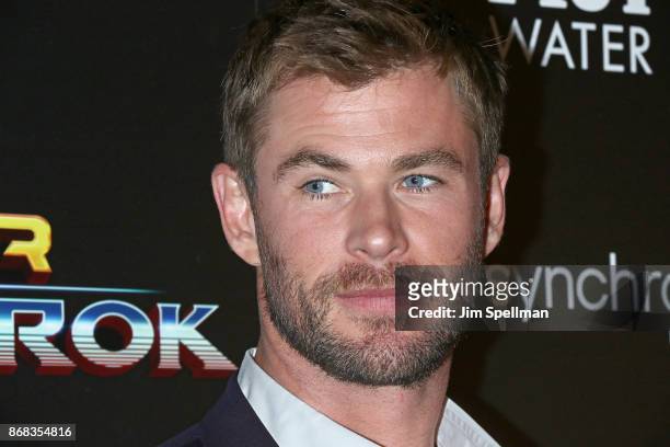 Actor Chris Hemsworth attends the screening of Marvel Studios' "Thor: Ragnarok" hosted by The Cinema Society with FIJI Water, Men's Journal and...