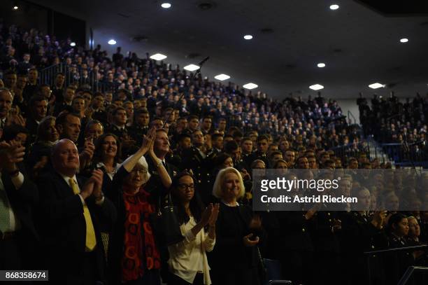 Audience members, including Cindy McCain give a standing ovation for U.S. Senator John McCain , Chairman of the Senate Armed Services Committee,...