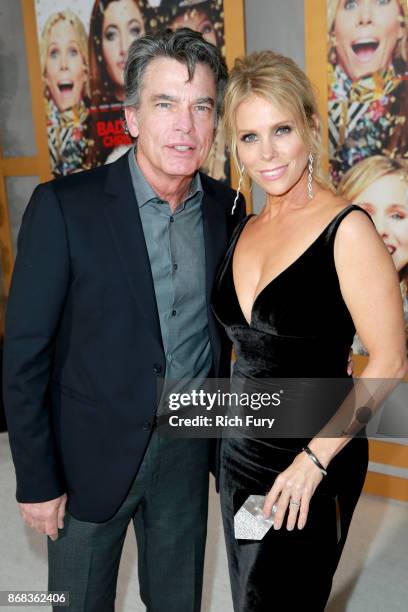 Peter Gallagher and Cheryl Hines attend the premiere of STX Entertainment's "A Bad Moms Christmas" at Regency Village Theatre on October 30, 2017 in...