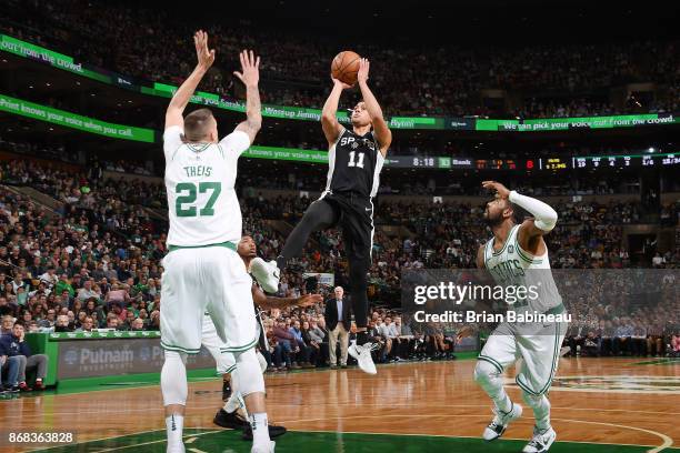 Bryn Forbes of the San Antonio Spurs shoots the ball against the Boston Celtics on October 30, 2017 at the TD Garden in Boston, Massachusetts. NOTE...