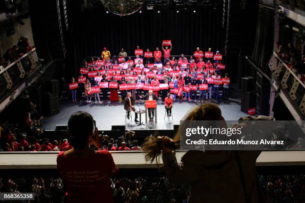 Sen. Bernie Sanders speaks to supporters next to New York City Mayor Bill de Blasio and the mayor's wife Chirlane McCray as they take part in a...