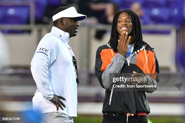East Carolina Pirates linebacker commit Gerard Stringer meets with East Carolina Pirates head coach Scottie Montgomery during a game between the BYU...
