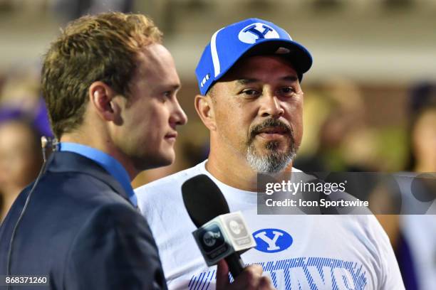 Former Brigham Young Cougars running back Peter Tuipulotu is interviewed during a game between the BYU Cougars and the East Carolina Pirates at...