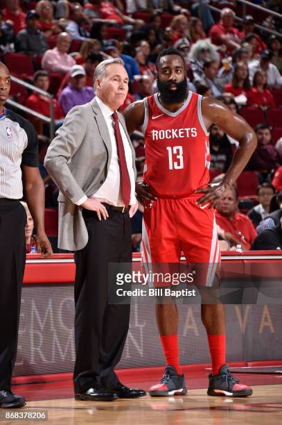 James Harden and Head Coach Mike D'Antoni of the Houston Rockets looks on during the game against the Philadelphia 76ers on October 30, 2017 at the...