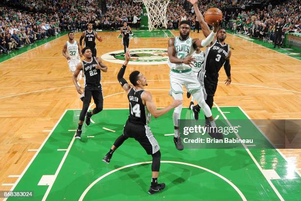 Jaylen Brown of the Boston Celtics drives to the basket against the San Antonio Spurs on October 30, 2017 at the TD Garden in Boston, Massachusetts....