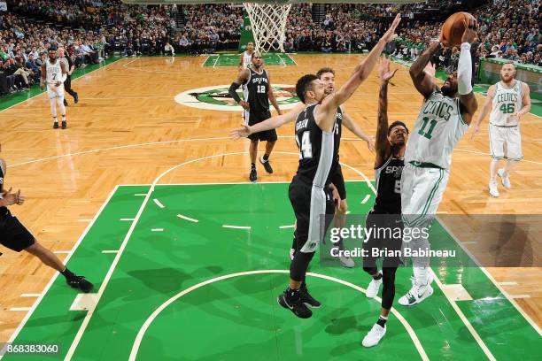 Kyrie Irving of the Boston Celtics shoots the ball against the San Antonio Spurs on October 30, 2017 at the TD Garden in Boston, Massachusetts. NOTE...