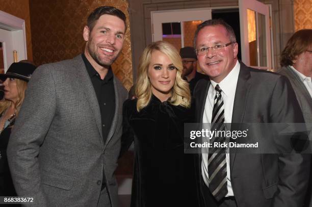 Player Mike Fisher, singer-songwriter Carrie Underwood and ACM/CEO Pete Fisher attend Nashville Shines for Haiti benefiting Sean Penn's J/P Haitian...