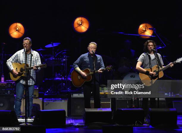 Eagles, Vince Gill, Don Henley and Deacon Frey perform during the Eagles in Concert at The Grand Ole Opry on October 29, 2017 in Nashville, Tennessee.