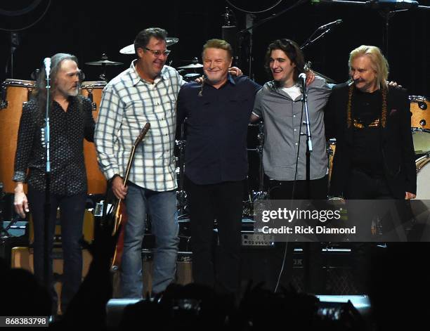 Eagles, Timothy B. Schmit, Vince Gill, Don Henley, Decon Frey and Joe Walsh perform during the Eagles in Concert at The Grand Ole Opry on October 29,...