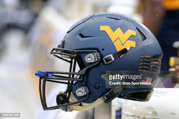 West Virginia Mountaineers helmet on the bench during the fourth quarter of the college football game between the Oklahoma State Cowboys and the West...