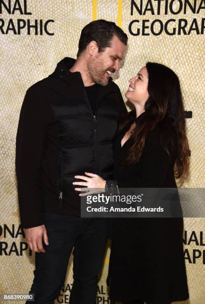 Actress Holly Marie Combs arrives at the premiere of National Geographic's "The Long Road Home" at Royce Hall on October 30, 2017 in Los Angeles,...