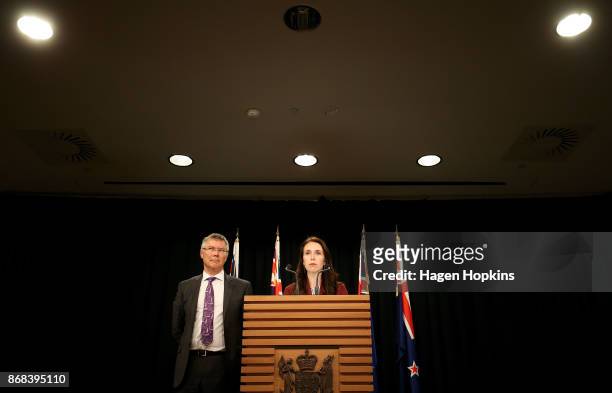 Prime Minister Jacinda Ardern and Minister for Economic Development David Parker look on during a post cabinet press conference at Parliament on...