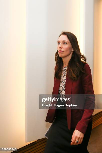 Prime Minister Jacinda Ardern makes an exit after a post cabinet press conference at Parliament on October 31, 2017 in Wellington, New Zealand....