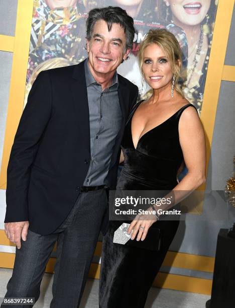 Peter Gallagher;Cheryl Hines arrives at the Premiere Of STX Entertainment's "A Bad Moms Christmas" at Regency Village Theatre on October 30, 2017 in...