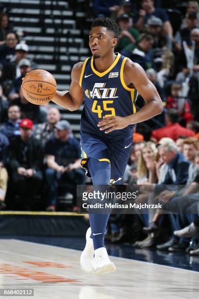 Donovan Mitchell of the Utah Jazz handles the ball against the Dallas Mavericks on October 30, 2017 at Vivint Smart Home Arena in Salt Lake City,...