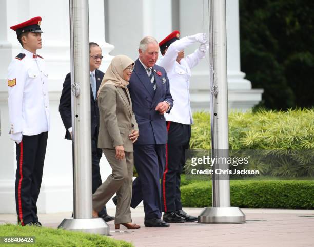 President of Singapore Halimah Yacob and Prince Charles, Prince of Wales, during the British Royals visit and official welcome to Istana Presidential...