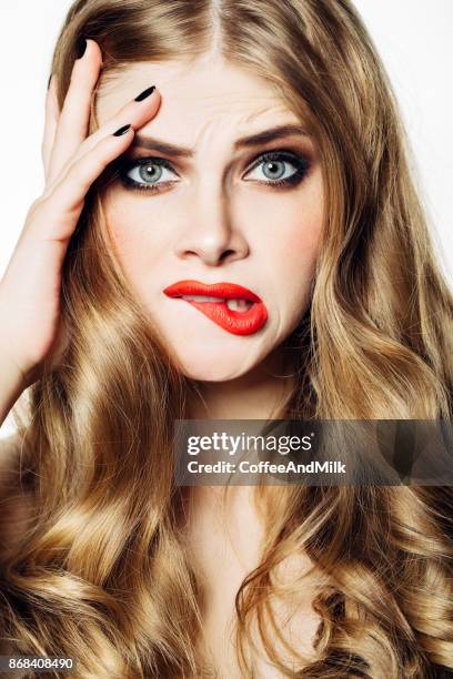 the upset woman having problems - studio shot lonely woman stock pictures, royalty-free photos & images