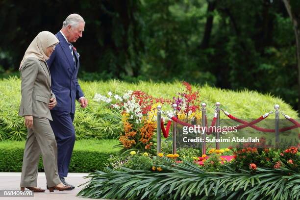 Prince Charles, Prince of Wales and Singapore President, Halimah Yacob arrive at the welcome ceremony at the Istana on October 31, 2017 in Singapore....