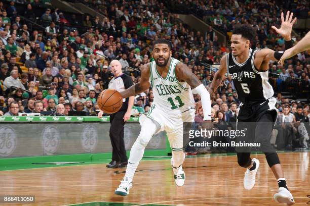Kyrie Irving of the Boston Celtics handles the ball against the San Antonio Spurs on October 30, 2017 at the TD Garden in Boston, Massachusetts. NOTE...