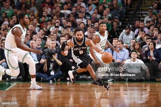 Patty Mills of the San Antonio Spurs handles the ball against the Boston Celtics on October 30, 2017 at the TD Garden in Boston, Massachusetts. NOTE...