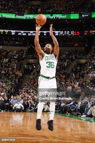 Marcus Smart of the Boston Celtics shoots the ball against the San Antonio Spurs on October 30, 2017 at the TD Garden in Boston, Massachusetts. NOTE...