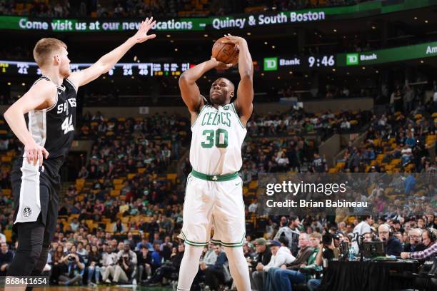 Guerschon Yabusele of the Boston Celtics handles the ball against the San Antonio Spurs on October 30, 2017 at the TD Garden in Boston,...