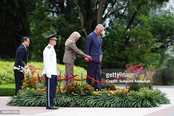 Prince Charles, Prince of Wales and Singapore President, Halimah Yacob arrive at the welcome ceremony at the Istana on October 31, 2017 in Singapore....