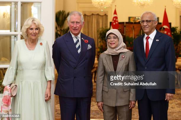 Prince Charles, Prince of Wales , Camilla, Duchess of Cornwall and Singapore President, Halimah Yacob and husband, Mohamed Abdullah Alhabshee pose...