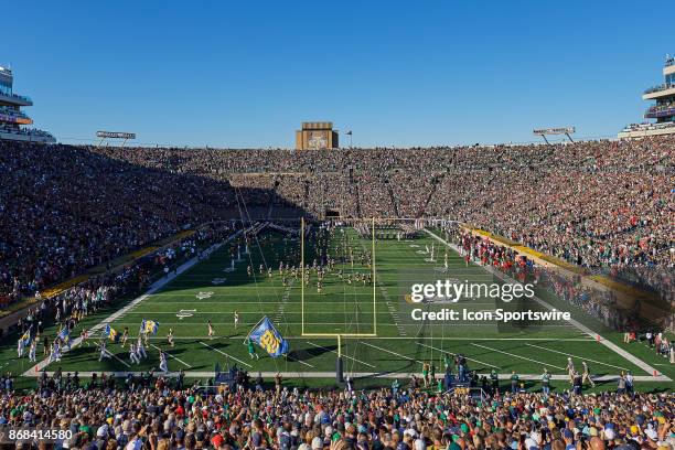General view of Notre Dame Stadium as Notre Dame Fighting Irish players, coaching staff and cheerleaders run onto the field prior to the start of the...
