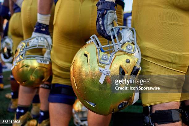 Detailed view of a Notre Dame Fighting Irish helmet is held by a player during the college football game between the Notre Dame Fighting Irish and...