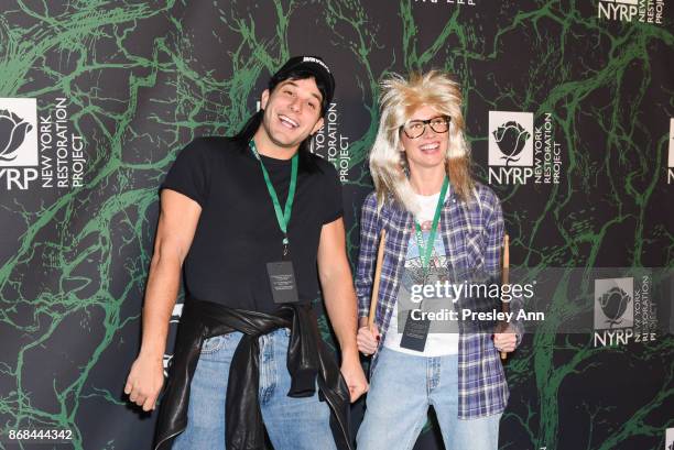 Skylar Astin and Anna Camp attend Bette Midler's 2017 Hulaween Event Benefiting The New York Restoration Project at Cathedral of St. John the Divine...