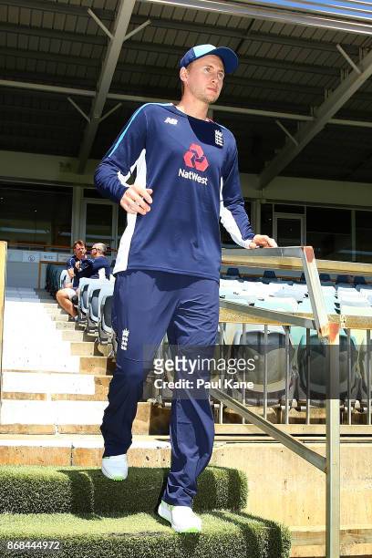 Joe Root of England walks down the players race onto the field during an England training session at the WACA on October 31, 2017 in Perth,...