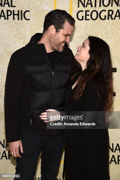 Actress Holly Marie Combs arrives at the premiere of National Geographic's "The Long Road Home" at Royce Hall on October 30, 2017 in Los Angeles,...