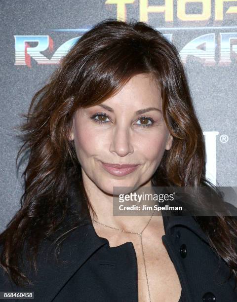 Actress Gina Gershon attends the screening of Marvel Studios' "Thor: Ragnarok" hosted by The Cinema Society with FIJI Water, Men's Journal and...