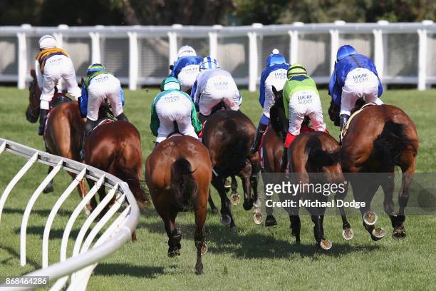 Damien Oliver riding Happy Clapper copped a 20 meeting suspsension after repeatedly bumping into Dean Yendall riding Royal Symphony here during Cox...