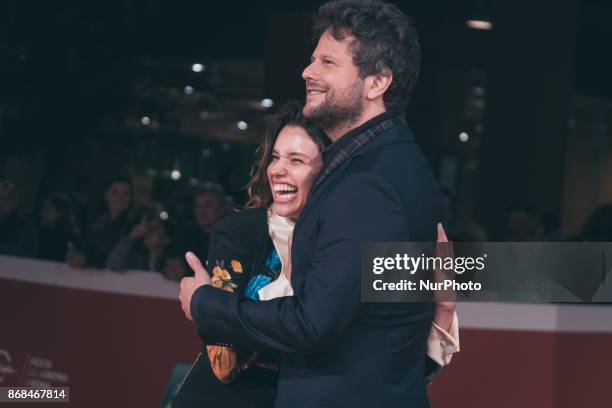 Selton Mello and Bruna Linzmeyer walk a red carpet for 'O Filme De Minha Vida' during the 12th Rome Film Fest at Auditorium Parco Della Musica on...
