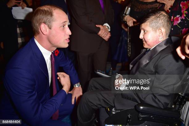 Prince William, Duke of Cambridge greets Moin Younis as he attends the Pride Of Britain Awards at the Grosvenor House on October 30, 2017 in London,...