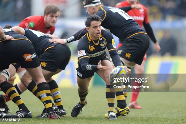 Nic Berry of London Wasps passes during the Aviva Premiership match between London Wasps and Saracens at Adams Park on February 12, 2012 in High...