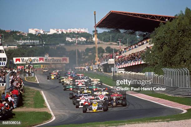 Keke Rosberg, Williams-Honda FW09B, Grand Prix of Portugal, Autodromo do Estoril, 21 October 1984. Keke Rosberg in the lead at the start of the 1984...