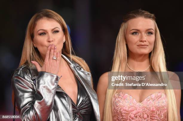 Eva Henger and Mercedes Schicchi walk a red carpet for 'Good Food' during the 12th Rome Film Fest at Auditorium Parco Della Musica on October 30,...