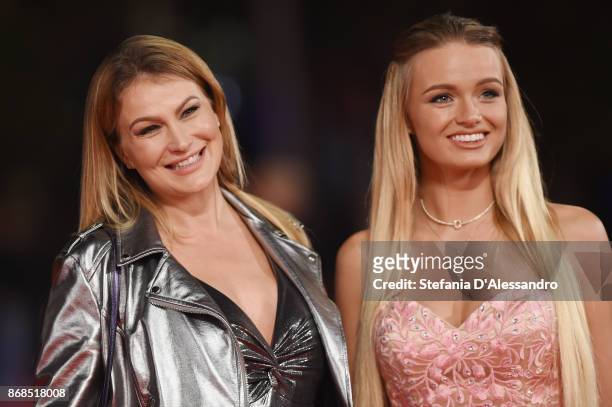 Eva Henger and Mercedes Schicchi walk a red carpet for 'Good Food' during the 12th Rome Film Fest at Auditorium Parco Della Musica on October 30,...