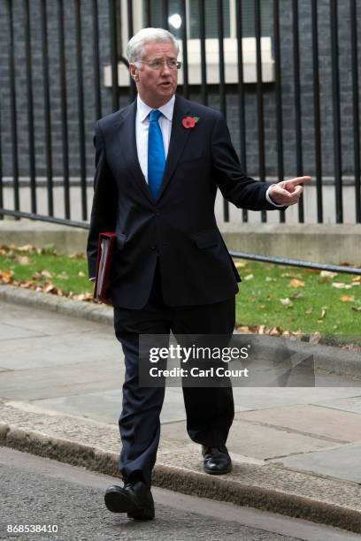 Defence secretary Michael Fallon leaves after attending a cabinet meeting in Downing Street on October 31, 2017 in London, England. The Prime...