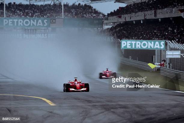 Rubens Barrichello, Michael Schumacher, Ferrari F2001, Grand Prix of Malaysia, Sepang International Circuit, 18 March 2001. Rubens Barrichello in the...